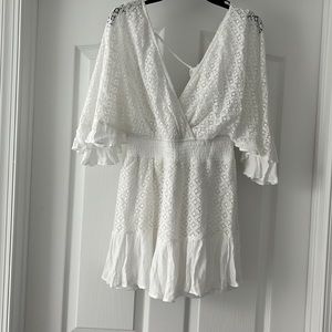 White lace short dress with shorts underneath.